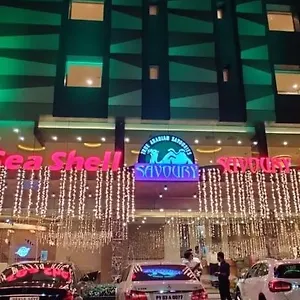 Seashell Savoury Restaurant & Residency Hotel
